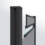 Black aluminum fence post with composite fence panel and glass insert installed