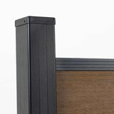 Black aluminum fence post with wood grain composite fence panel, co-extruded composite outdoor fencing detail