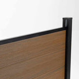 Wood look composite fence panel top rail with black aluminum post, co-extruded composite outdoor fencing detail