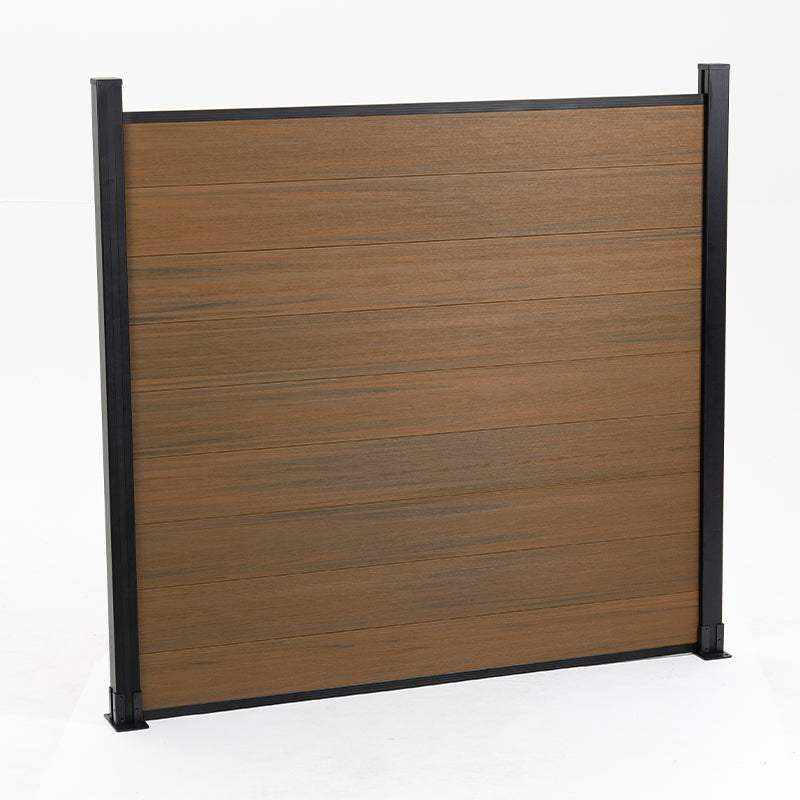 Wood look composite privacy fence panel with black aluminum posts, co-extruded composite outdoor fencing system