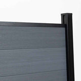 Gray composite fence panel with black aluminum post, close up of modern outdoor privacy fencing system
