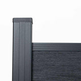 Black co-extruded composite fence panel with aluminum post and top rail close-up