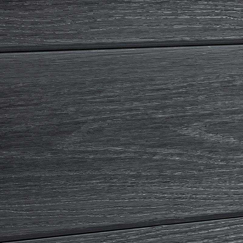Close-up of black co-extruded composite fence board with realistic wood grain texture