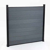 Modern gray composite fence panel with black aluminum posts, outdoor privacy fencing, durable low maintenance system