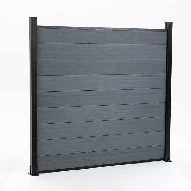 Gray composite privacy fence panel with black aluminum posts, modern outdoor fencing system, low maintenance design