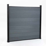 Gray composite privacy fence panel with black aluminum posts, modern outdoor fencing system, low maintenance design